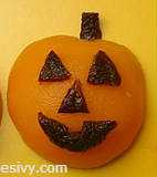 Jack o'lantern peach half