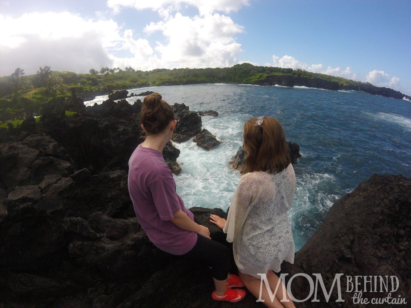 GOPRO photo of black sand beach taken in Hawaii with teens.